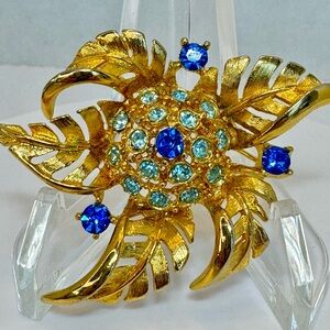 Vintage Gold-Tone Floral Brooch with Blue and Aqua Crystals